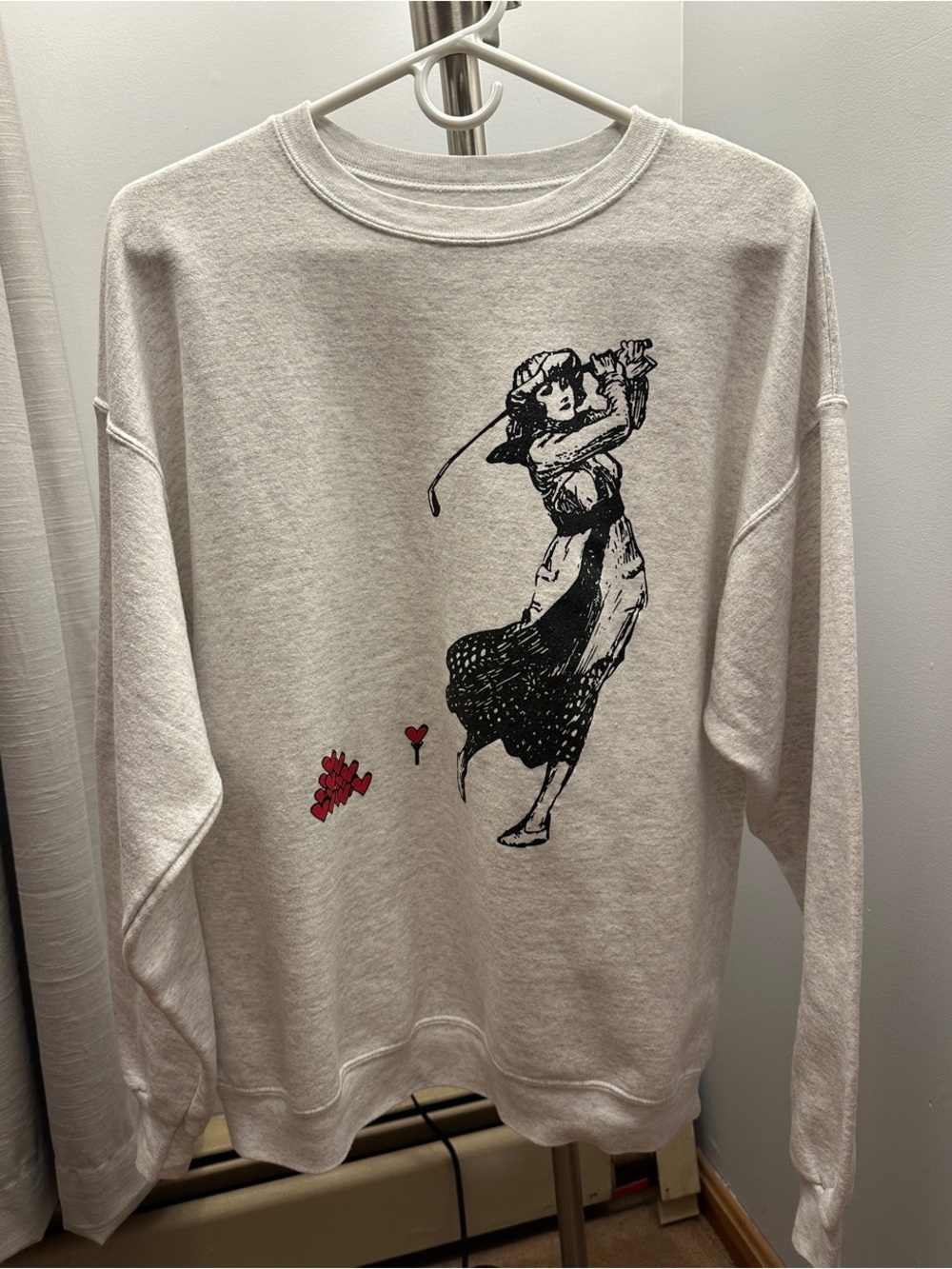 Graphic Golfing Woman Sweatshirt in Light Heather with Red Accent